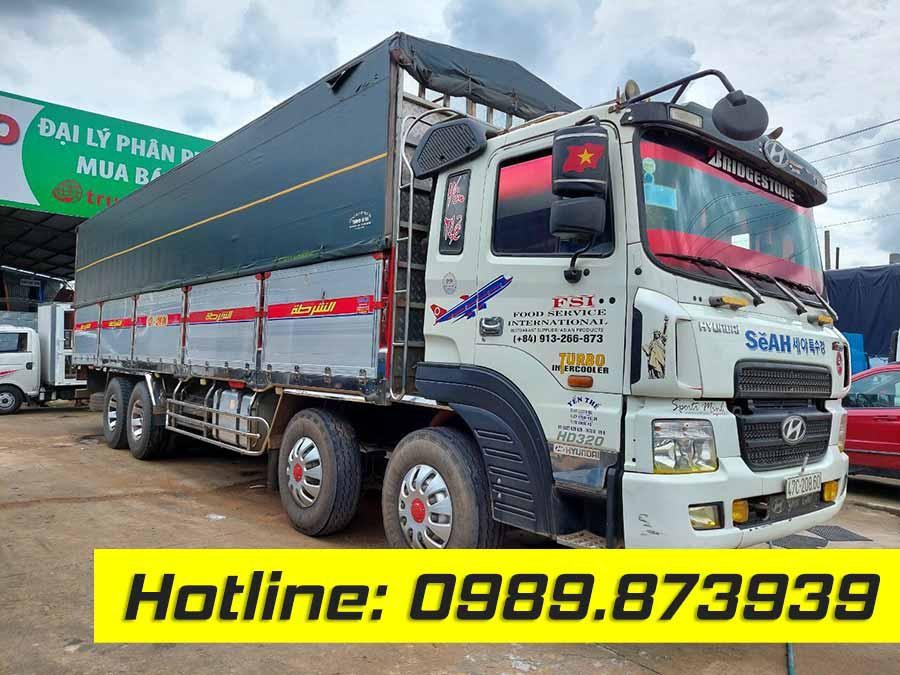 Hình ảnh xe tải Hyundai HD320 4 chân cũ mui bạt bửng tôn đời 2014, một lựa chọn phổ biến trên thị trường xe tải cũ