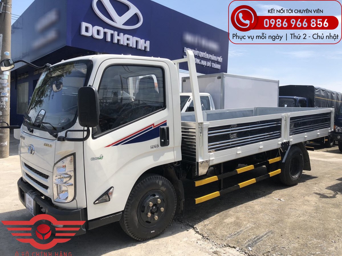 Image latérale du camion plateau Dothanh IZ65 Gold 3.5 tonnes