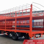 alt text: Xe tải Isuzu NPR 400 3T5 thùng chở xe máy 2 tầng, giải pháp vận chuyển xe máy hiệu quả