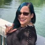 The author saying "I love you" in American Sign Language.
