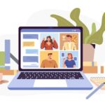 Một người đang sử dụng laptop trong không gian làm việc hiện đại, tập trung vào công việc, với các thiết bị công nghệ khác xung quanh, thể hiện môi trường làm việc hiệu quả và năng động