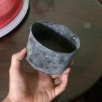 Đong gạo bằng lon sữa Ông Thọ là hình ảnh quen thuộc ở miền Tây