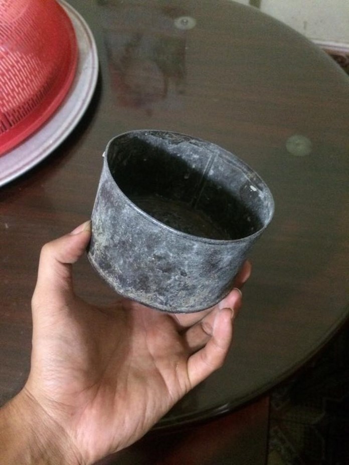 Đong gạo bằng lon sữa Ông Thọ là hình ảnh quen thuộc ở miền Tây