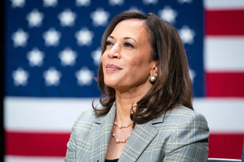 Kamala Harris in pearls and a plaid blazer