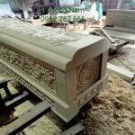 Quan tài gỗ vàng tâm chạm rồng