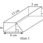 Hình ảnh minh họa khối hình thang đứng với các kích thước đáy lớn, đáy nhỏ, chiều cao hình thang và chiều cao khối hình thang
