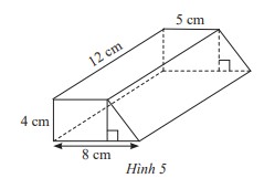 Hình ảnh minh họa khối hình thang đứng với các kích thước đáy lớn, đáy nhỏ, chiều cao hình thang và chiều cao khối hình thang