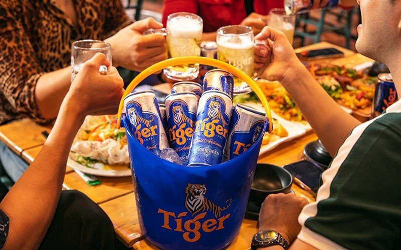 Ảnh bia Tiger với nhiều dòng sản phẩm khác nhau, thể hiện sự đa dạng và phong phú