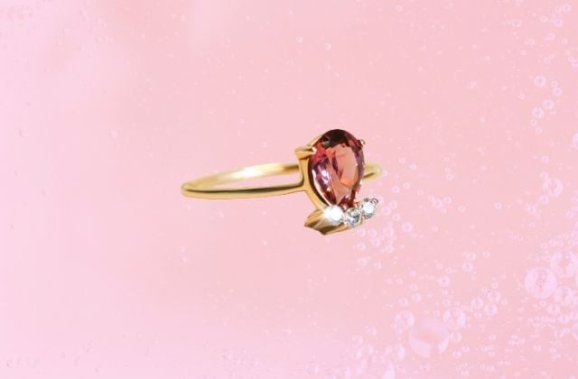 Nhẫn vàng 18K nữ đính đá Spinel tím