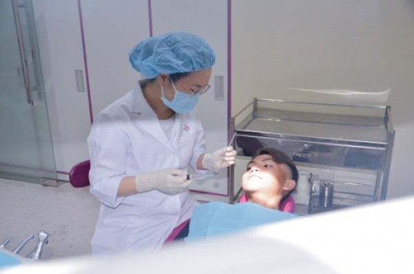 chi phí nhổ răng khôn có bảo hiểm y tế
